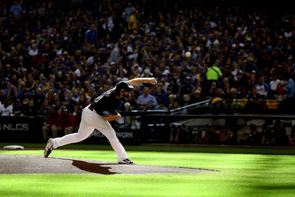 Baseball action during the Brewers and Dodgers postseason matchup.